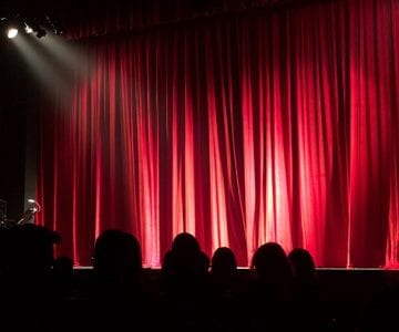 Theatre background graphic by JLB which is the best website design, website support and SEO Franklin, Brentwood, Nashville, TN.